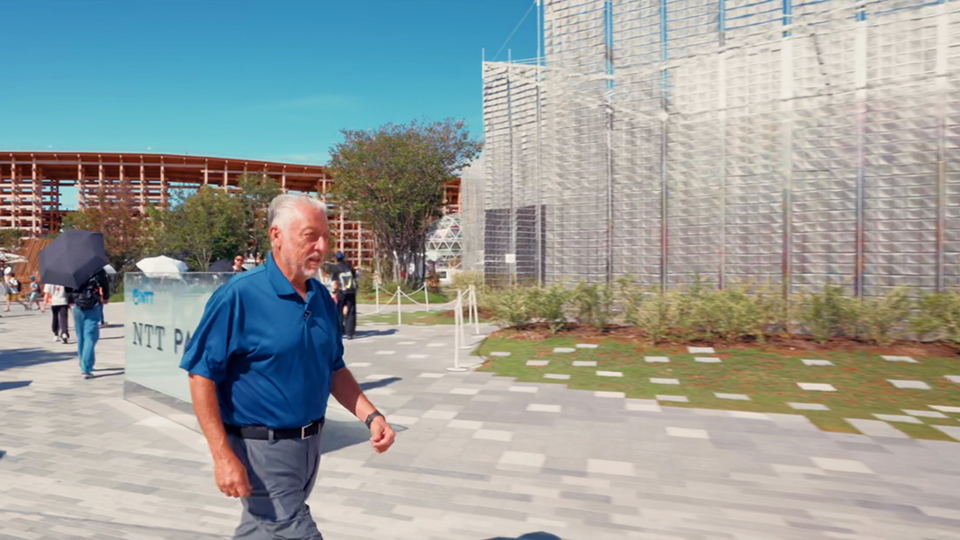 Vito Mabrucco, NTT Inc brand evangelist, walking by the NTT pavilion at Expo 2025